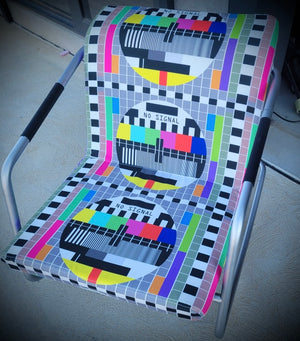 TV Test Pattern chrome rocking armchair