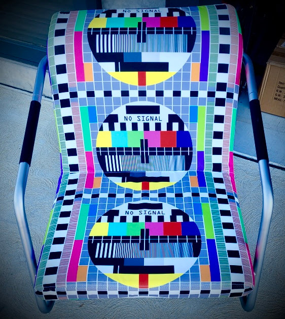 TV Test Pattern chrome rocking armchair